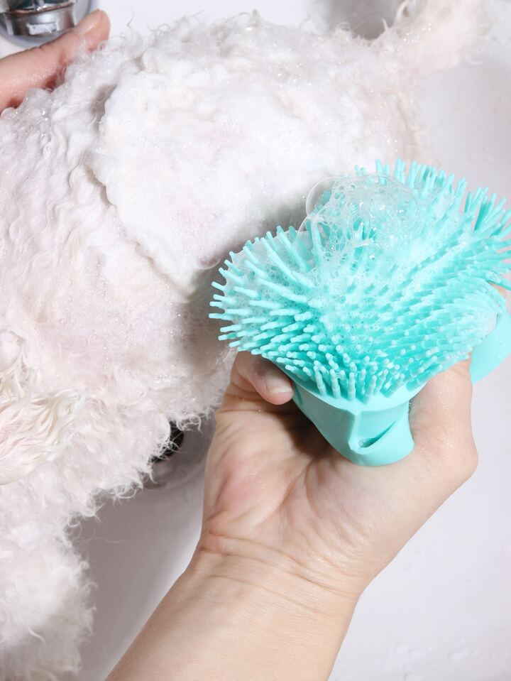 Pet grooming brush